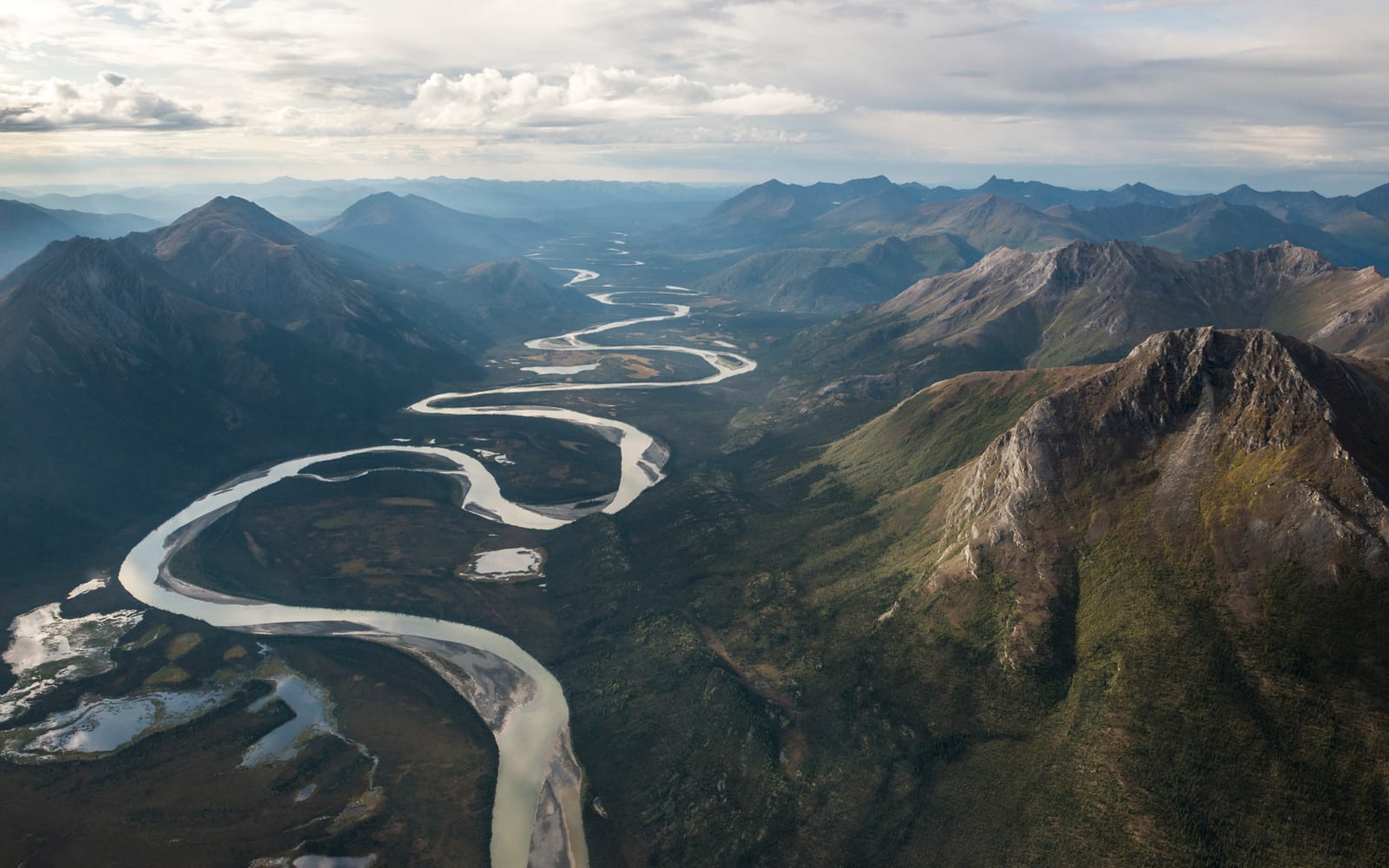 Aerial view of the Alatna River as it winds through a valley